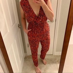 AQUA red, black, and blue pants jumpsuit